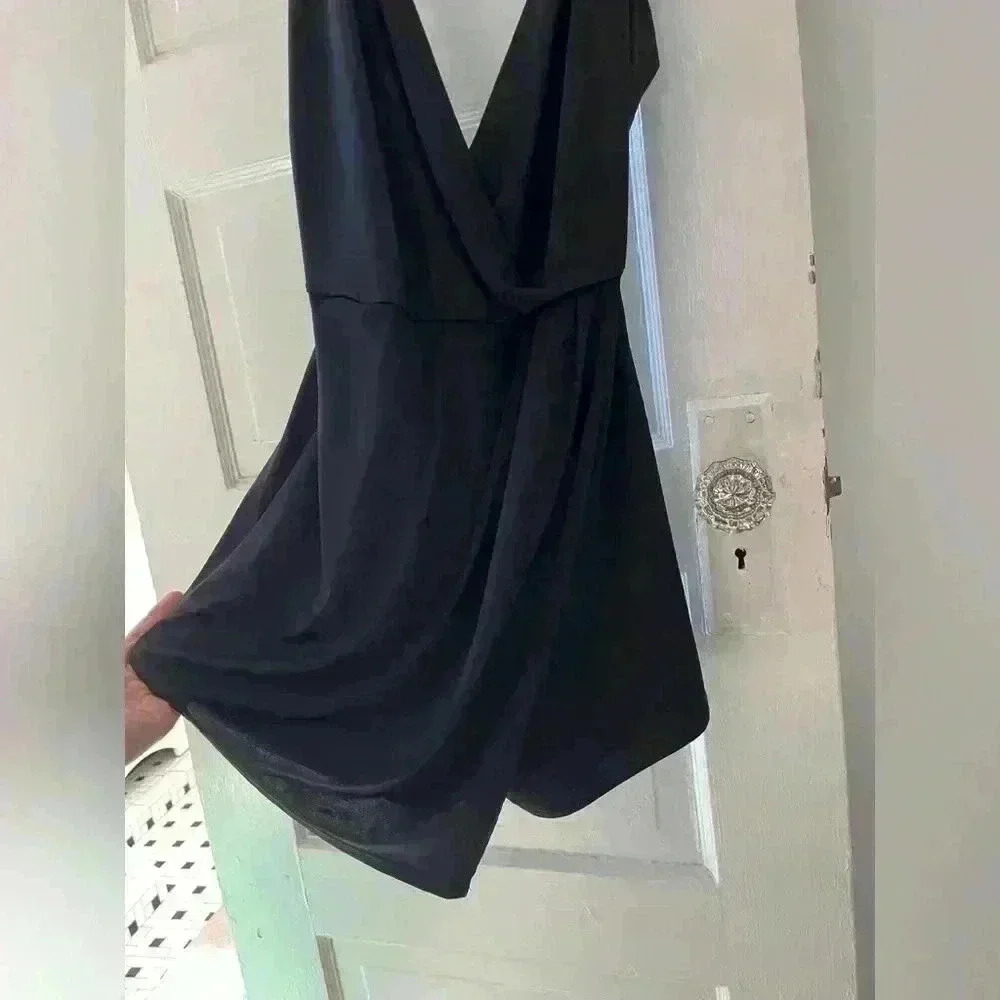 deep V-neck, soft and flowing romper‎ from Charlotte Russe